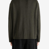 Green knitwear, full body view
