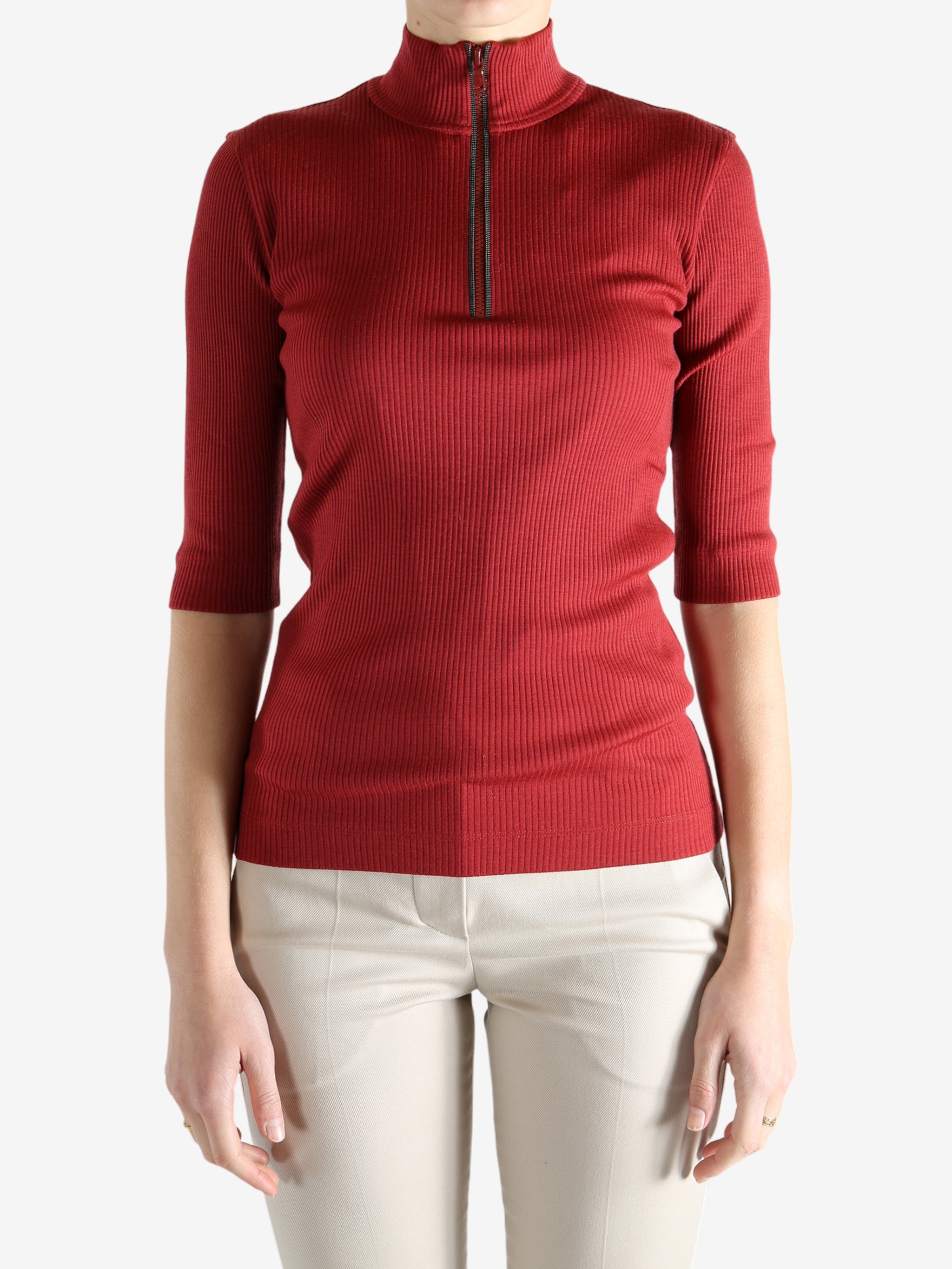 Red shirts worn by a person, showing the shirts fit