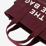 Close up of red bag,showing texture of the cotton fabric