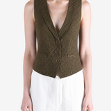 Green tops worn a person,showing the tops fit