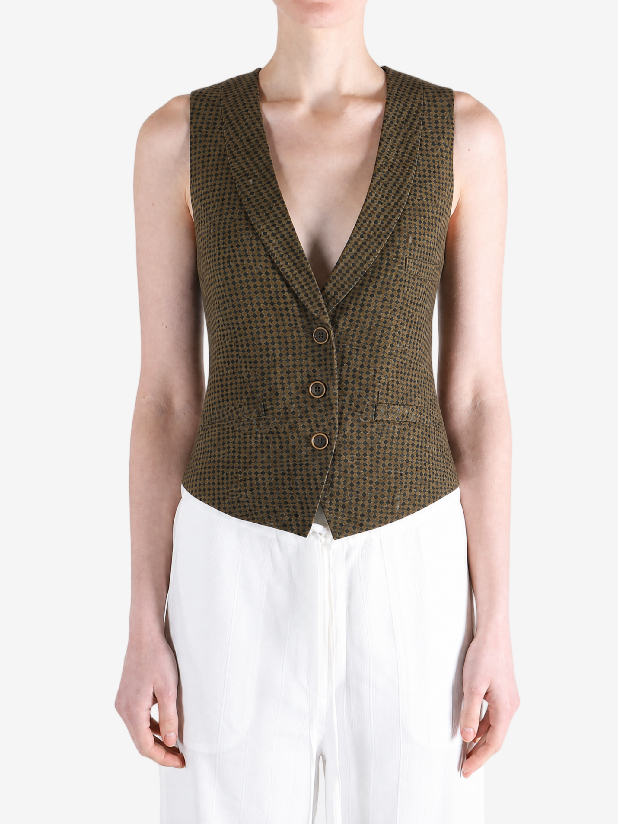 Green tops worn a person,showing the tops fit