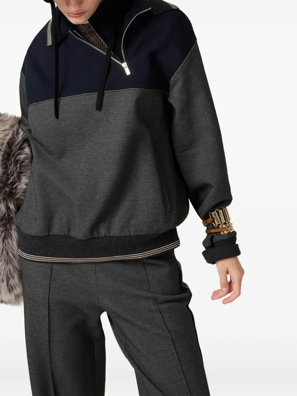 Close up of the grey sweatshirt, showing texture of the viscose fabric