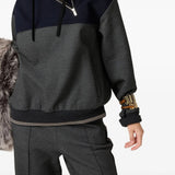 Close up of the grey sweatshirt, showing texture of the viscose fabric