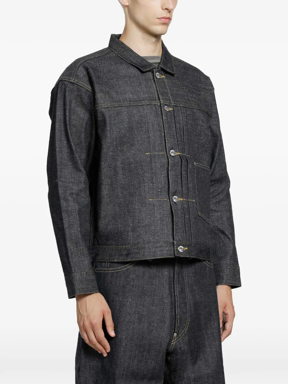 Navy jacket worn by a person, showing the jacket fit