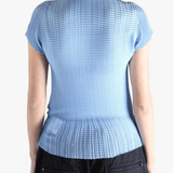 Blue t-shirt worn by a person, showing the t-shirt's fit