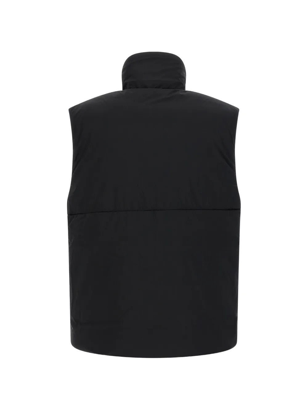 Black jacket worn by a person, showing the jacket fit