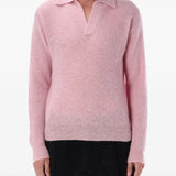 Pink shirt worn by a person, showing the shirt's fit