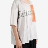 Tan t-shirt worn by a person, showing the t-shirt fit