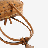 Close up of brown bag, showing texture of the Canvas Leather fabric