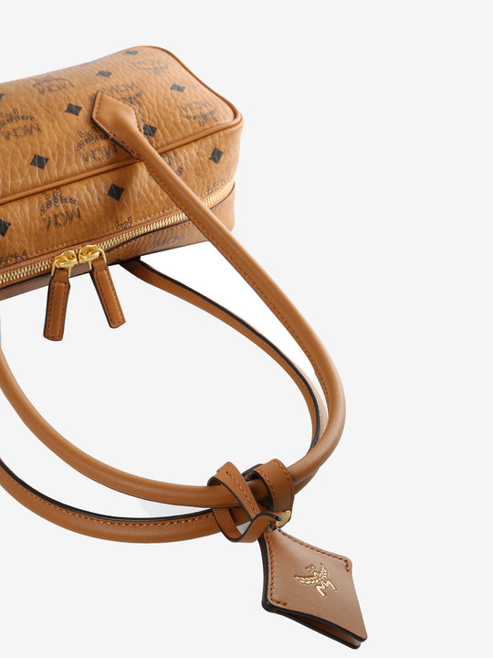 Close up of brown bag, showing texture of the Canvas Leather fabric