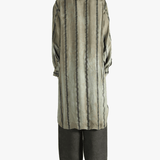 Grey top worn by a person, showing the top's fit