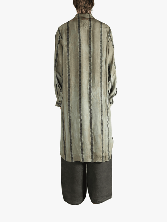 Grey top worn by a person, showing the top's fit