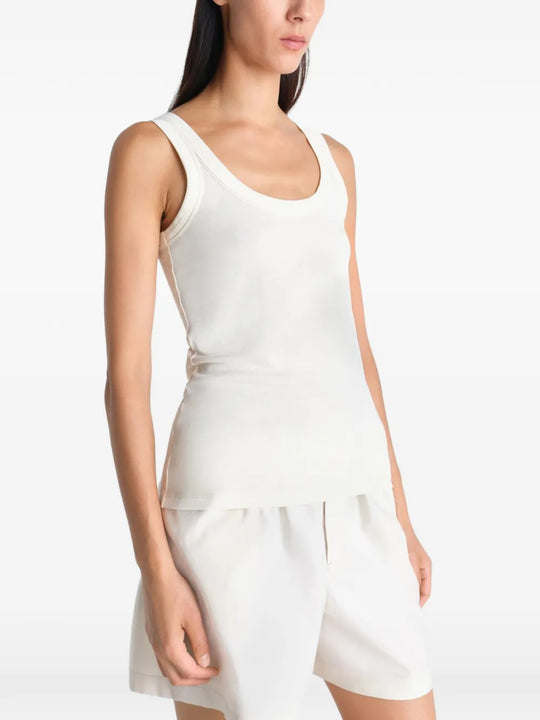 Tan top worn by a person, showing the top fit