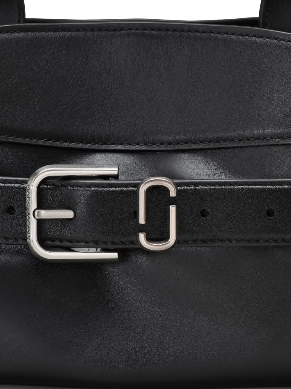 Close up of the black bag, showing texture of the leather fabric