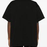 Black T-shirt  worn by a person, showing the  shirt's fit