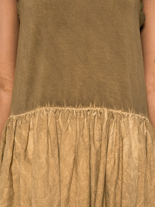 Close up of brown dress,showing texture of the cotton fabric