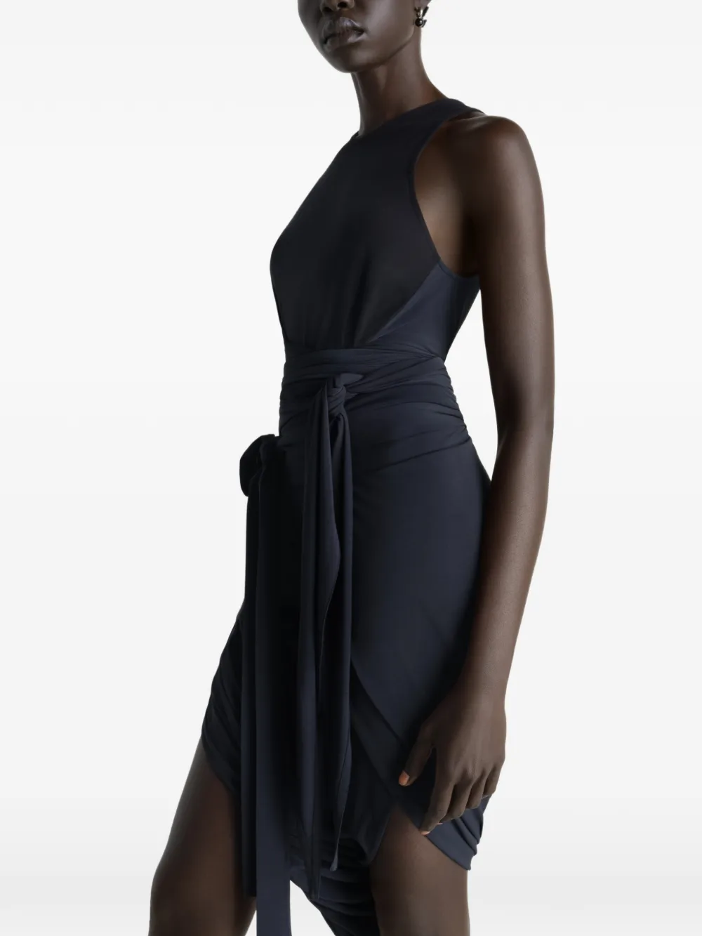 Black top worn by a person, showing the tops fit