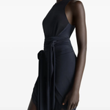 Black top worn by a person, showing the tops fit