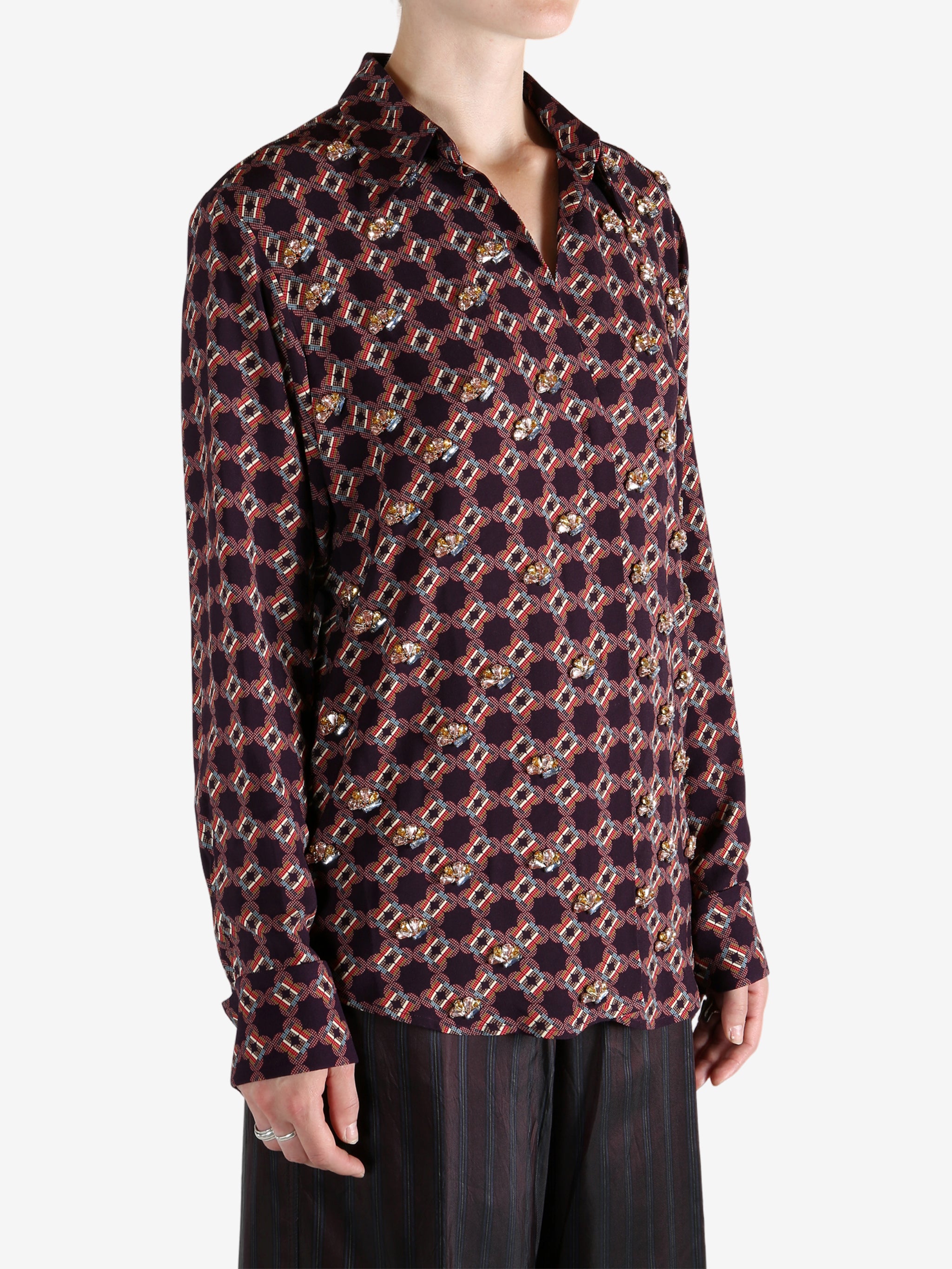 Red shirt worn by a person, showing the shirt fit