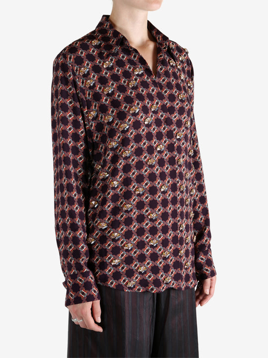 Red shirt worn by a person, showing the shirt fit