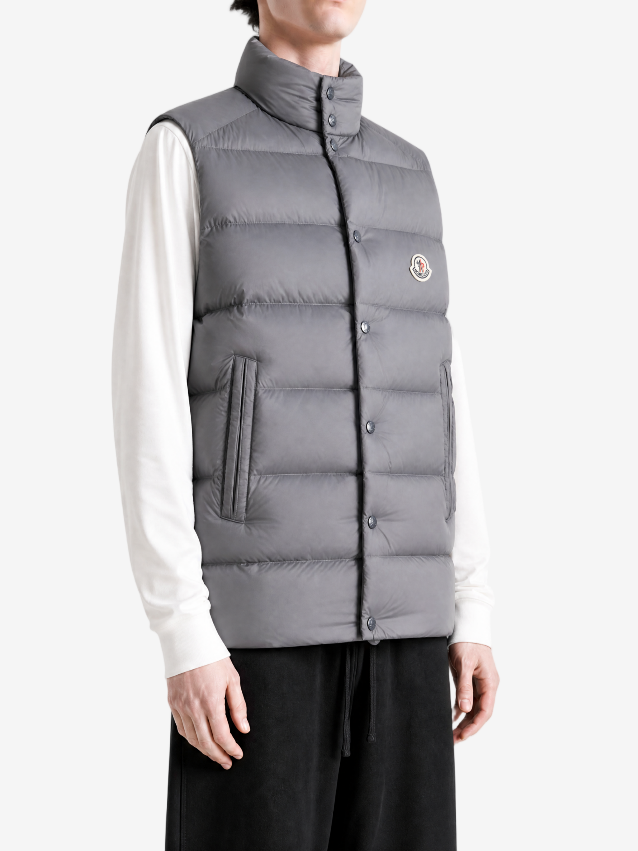 Grey jacket worn by a person, showing the jacket fit