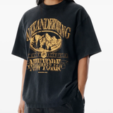 Black t-shirt worn by a person, showing the shirt's fit