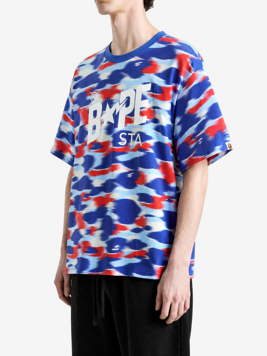 Blue t-shirt worn by a person, showing the t-shirt fit