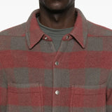 Close up of the red shirt, showing texture of the wool fabric