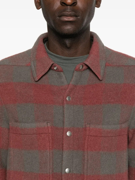 Close up of the red shirt, showing texture of the wool fabric