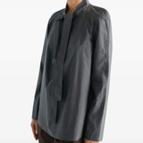 Grey dress worn by a person, showing the dress fit