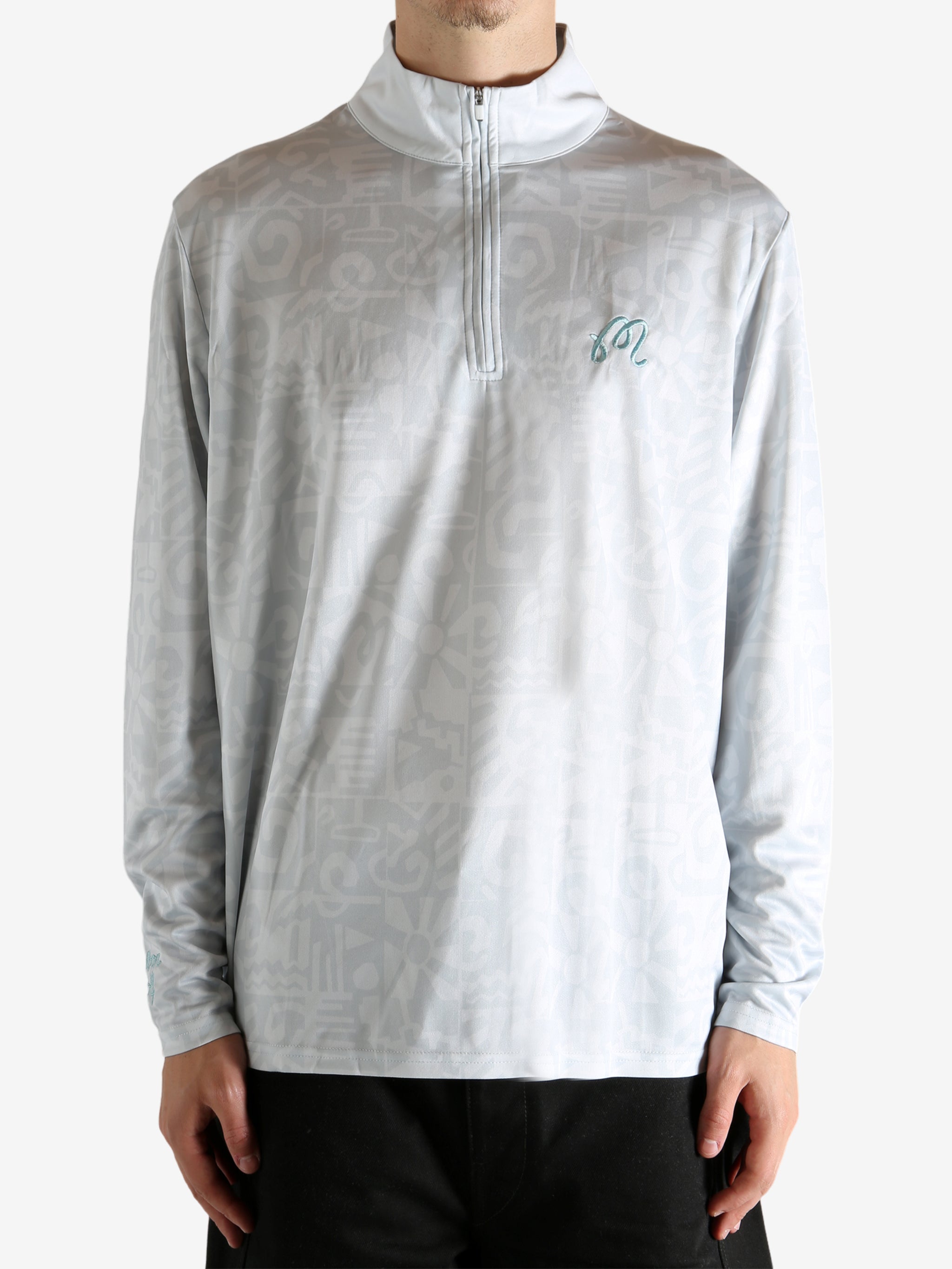 Grey jacket worn by a person, showing the jacket's fit