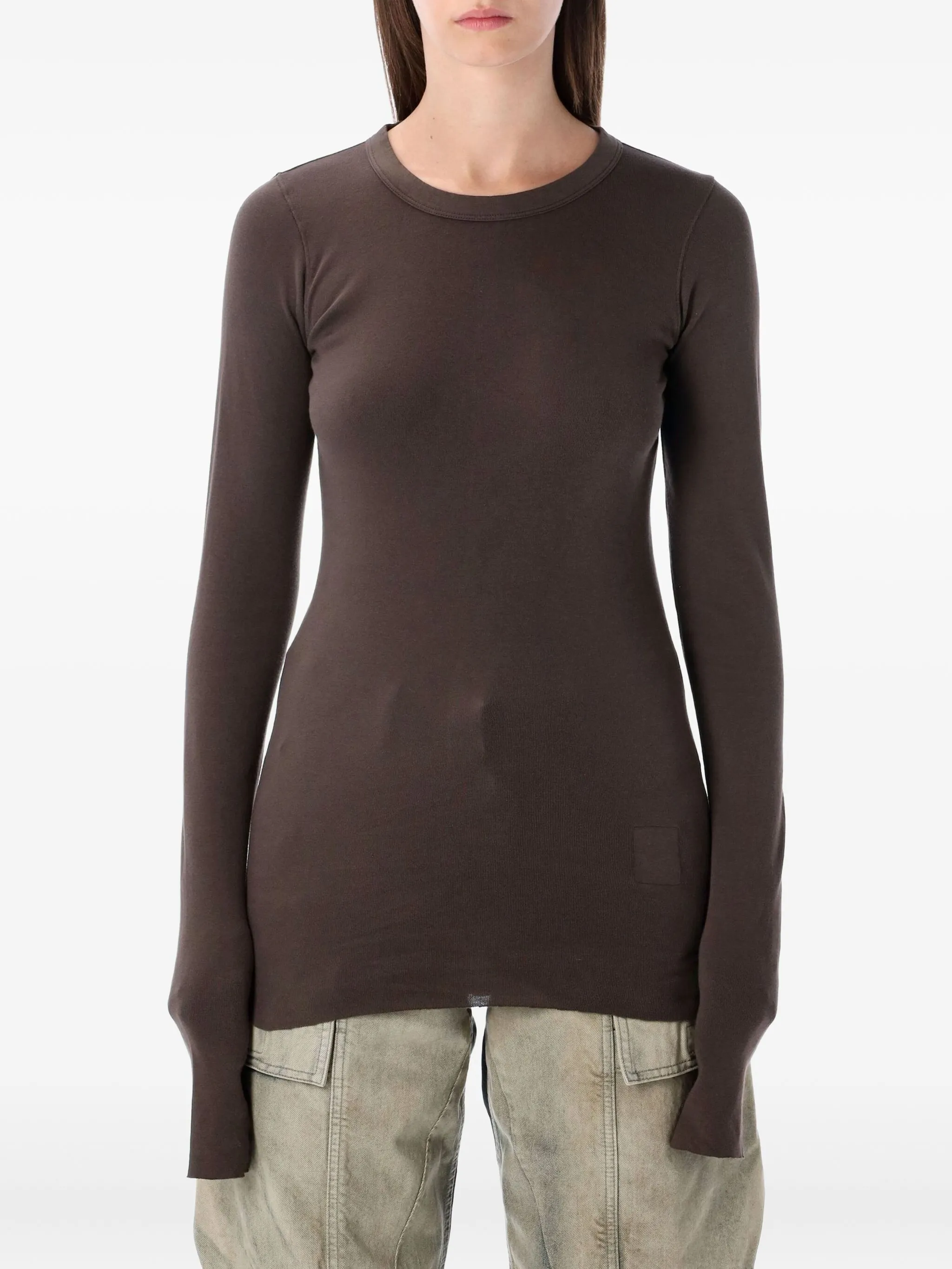 Brown long sleeves worn by a person, showing the T-shirt fit