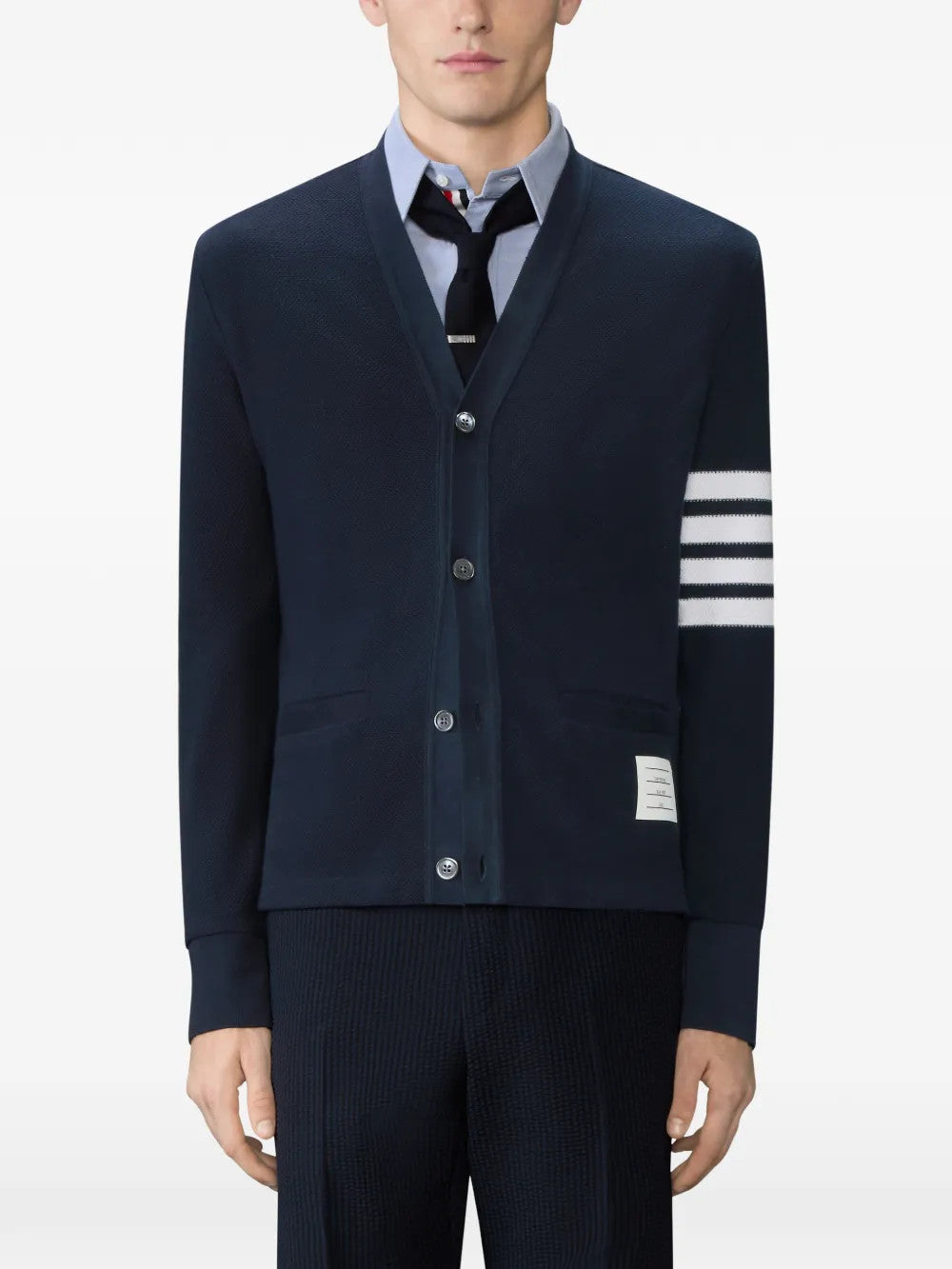 Navy t-shirt worn by a person, showing the t-shirt fit
