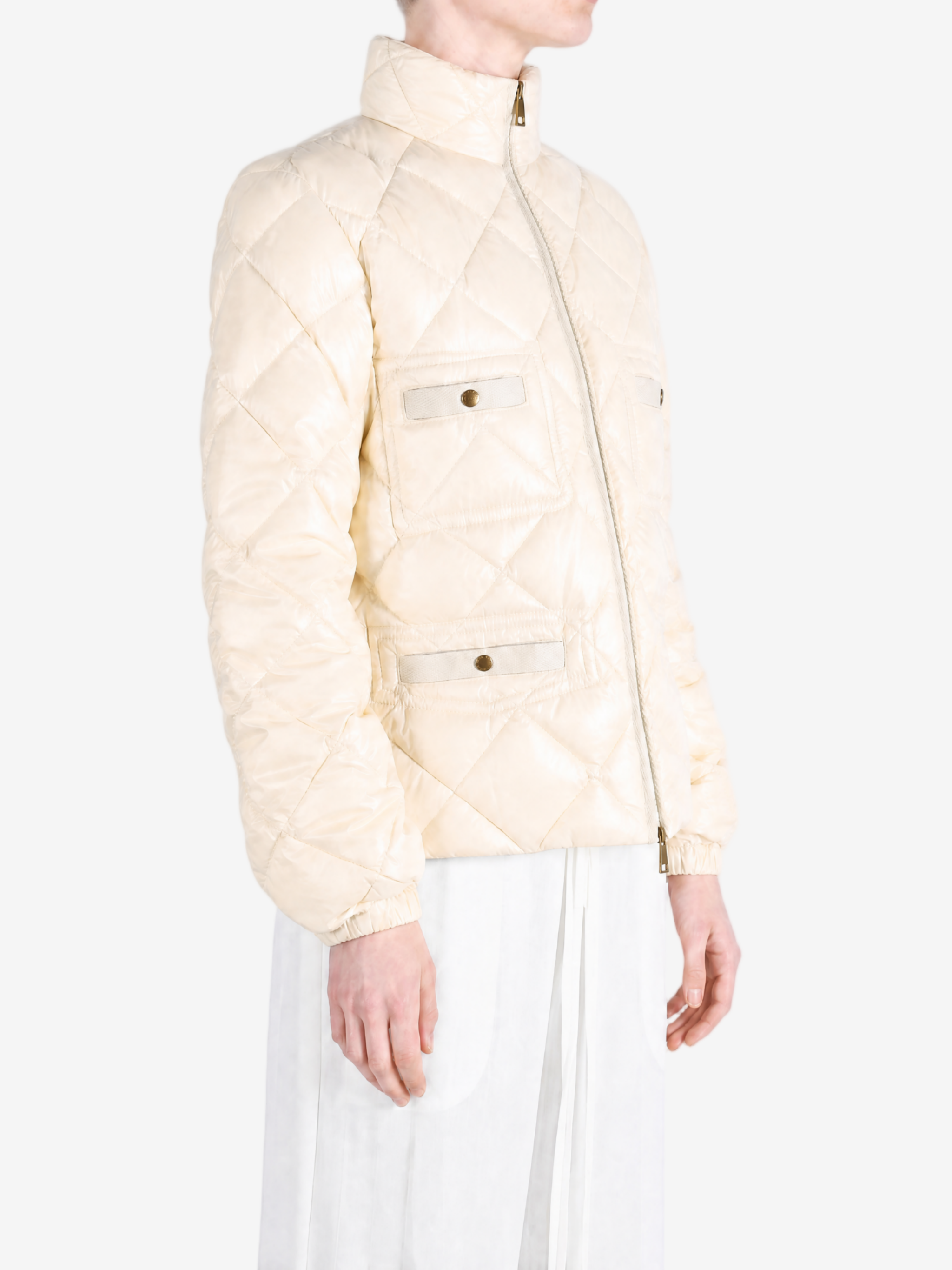 White jacket worn by a person, showing the jacket fit