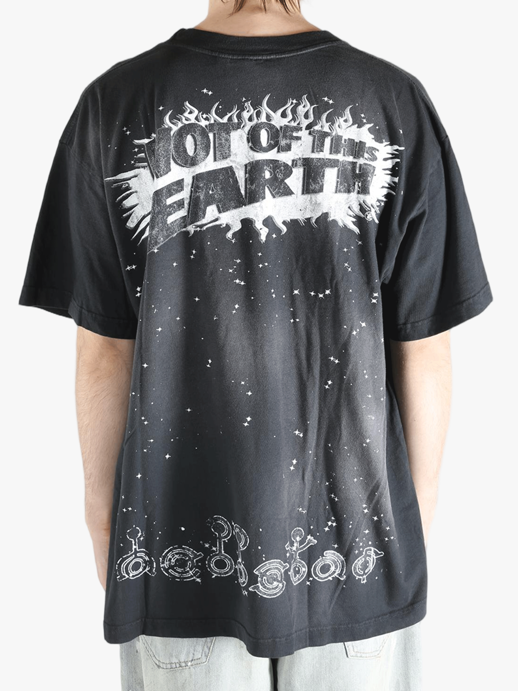 Black t-shirts worn by a person, showing the t-shirts fit