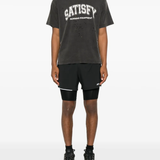 Black shirt worn by a person, showing the shirt fit