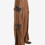 Brown pant worn by a person, showing the pant’s fit