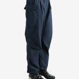 Navy pants worn by a person, showing the pants' fit
