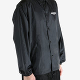 Black jackets worn by a person, showing the jackets fit