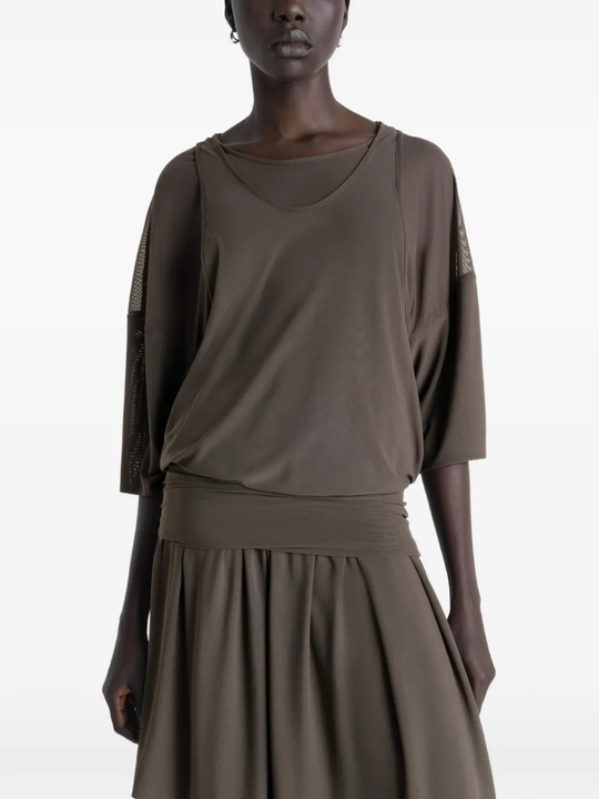 Close up of brown dresses, showing texture of the nylon fabric