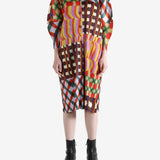 Pink coat worn by a person, showing the coat fit