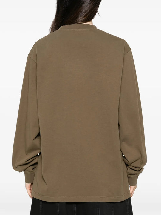 Brown top, full body view