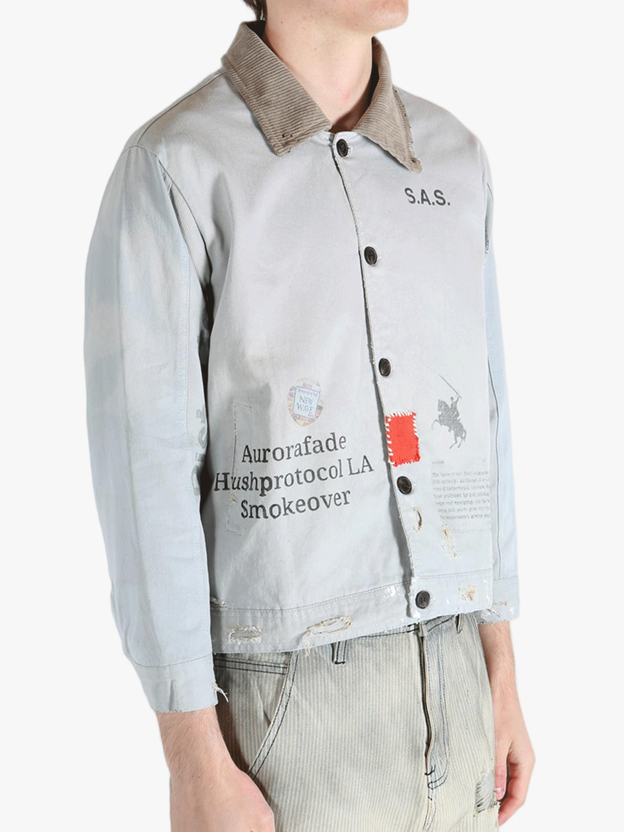 Grey jacket worn by a person, showing the jacket's fit