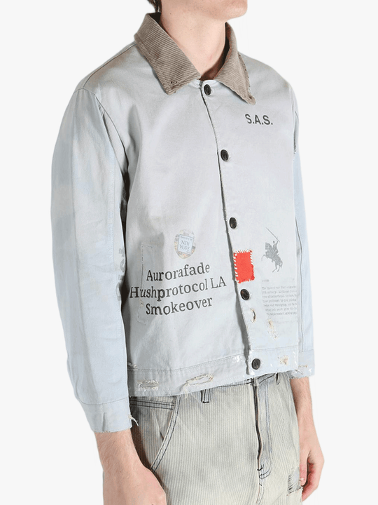 Grey jacket worn by a person, showing the jacket's fit