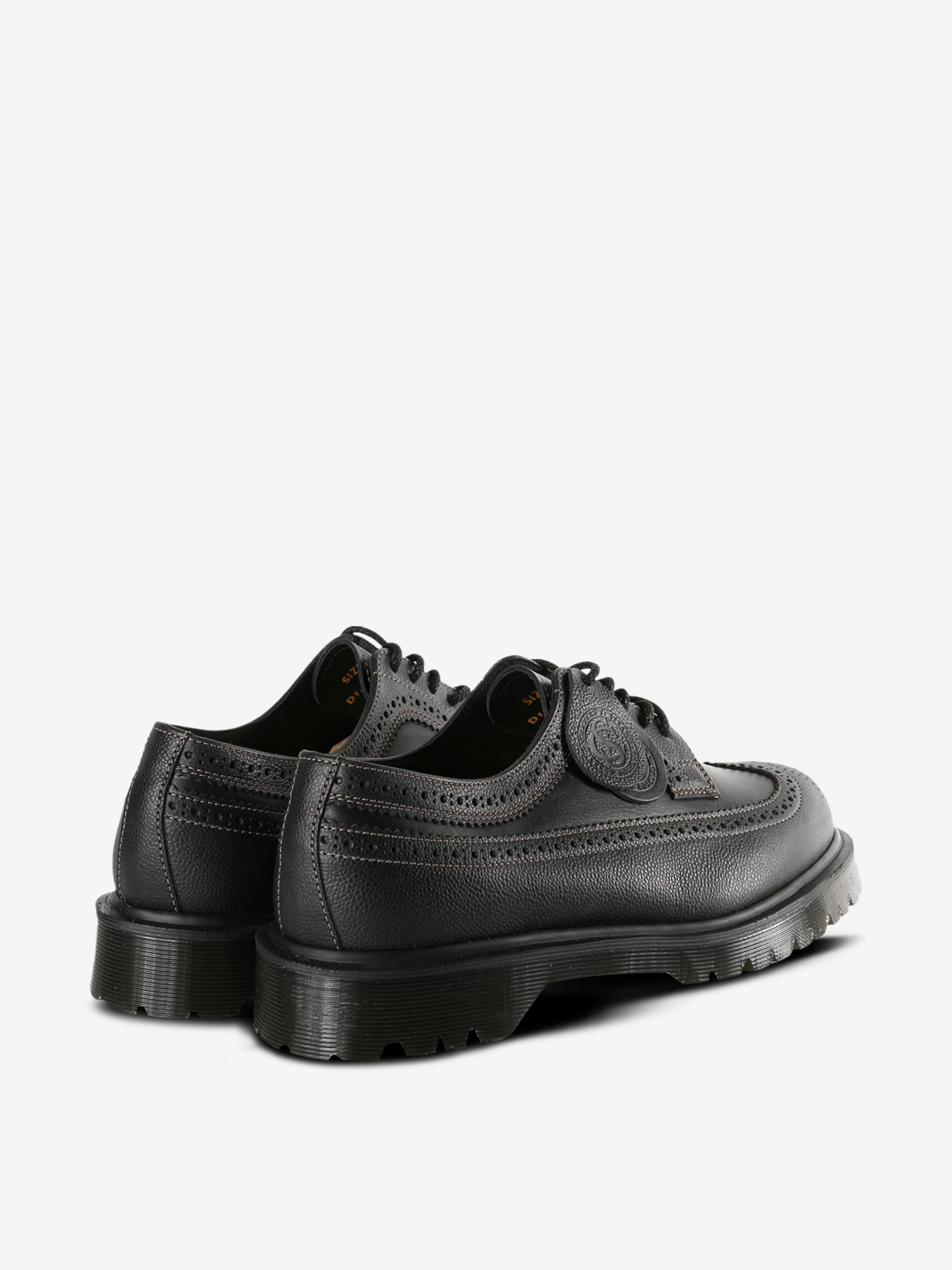 Black derby, back view