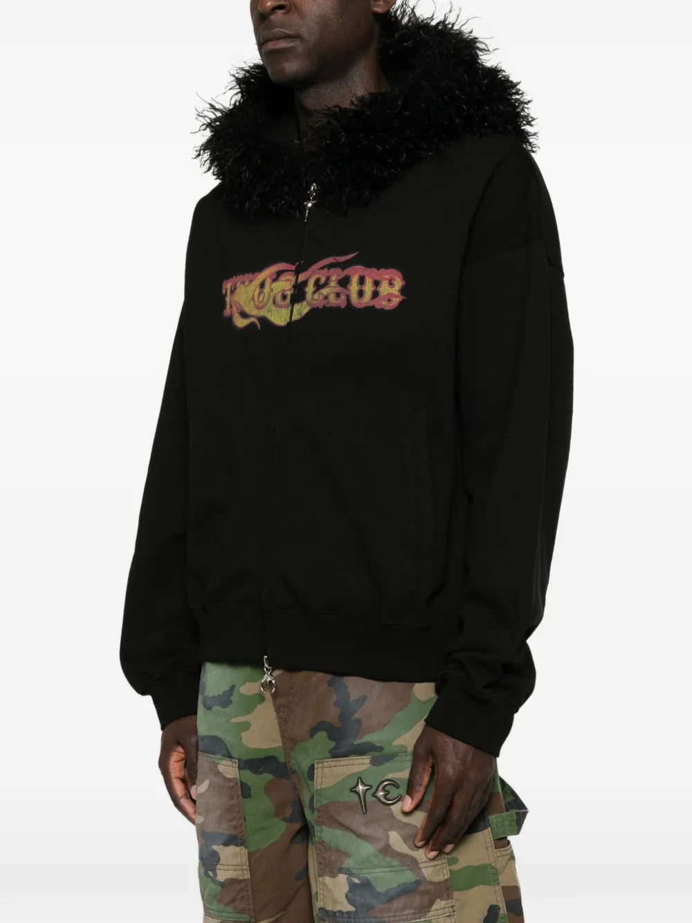 Black hoodie worn by a person, showing the hoodie fit
