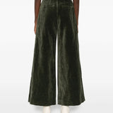 Green pant worn by a person, showing the pant’s fit