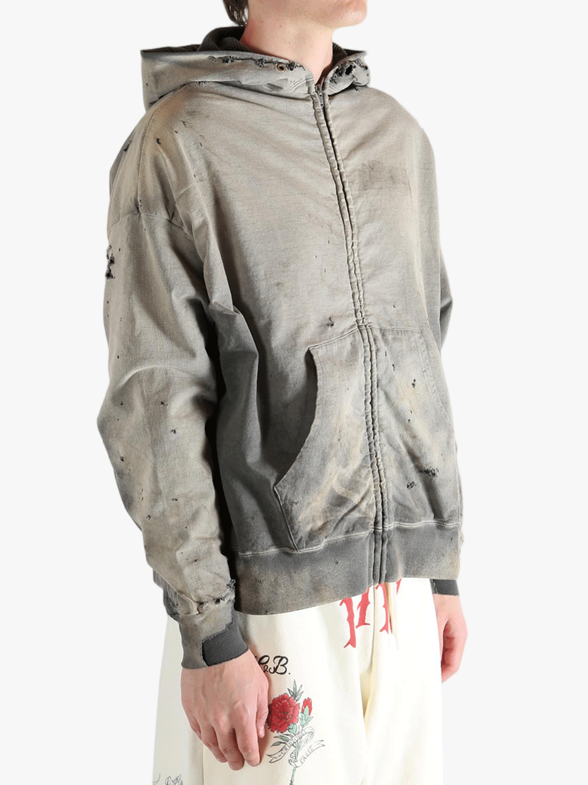 Grey sweats-hoodies worn by a person, showing the sweats-hoodies's fit