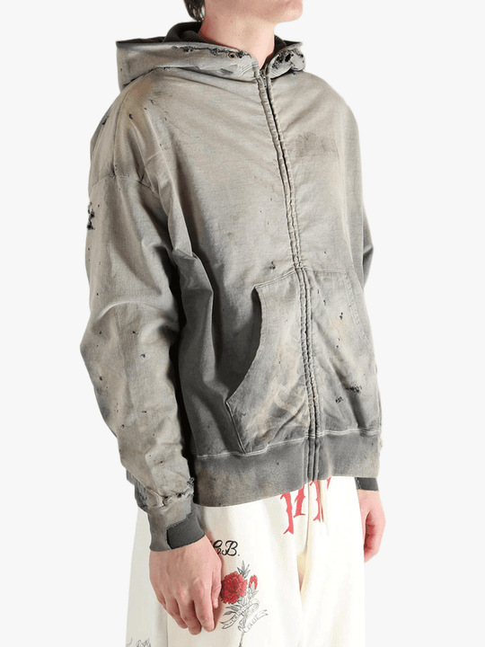 Grey sweats-hoodies worn by a person, showing the sweats-hoodies's fit