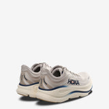 grey sneakers, side view